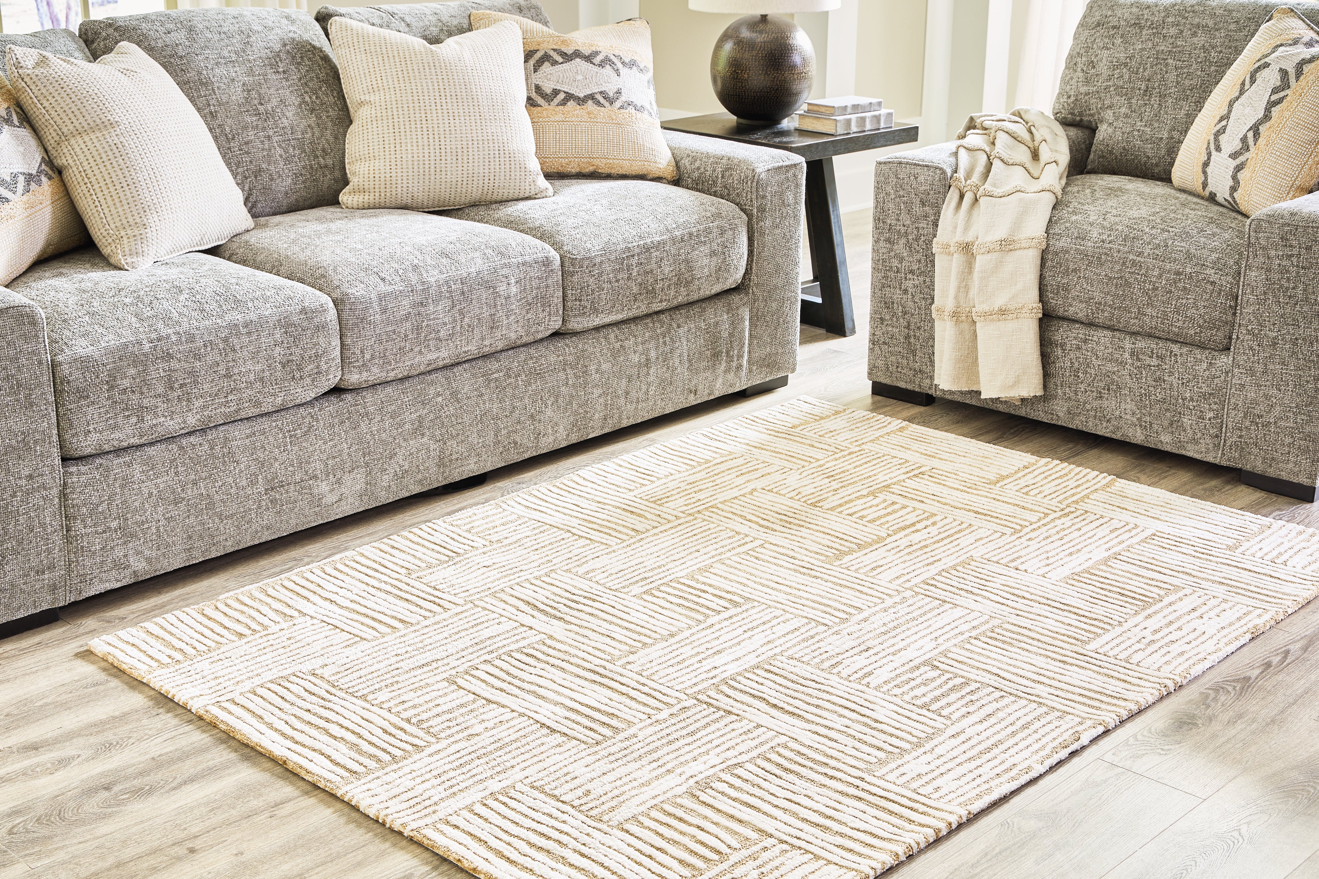 Elite Furniture Outlet - Ashley Furniture - Adanmund Rug - 5' x 7' Rug / Beige/Caramel - R406412