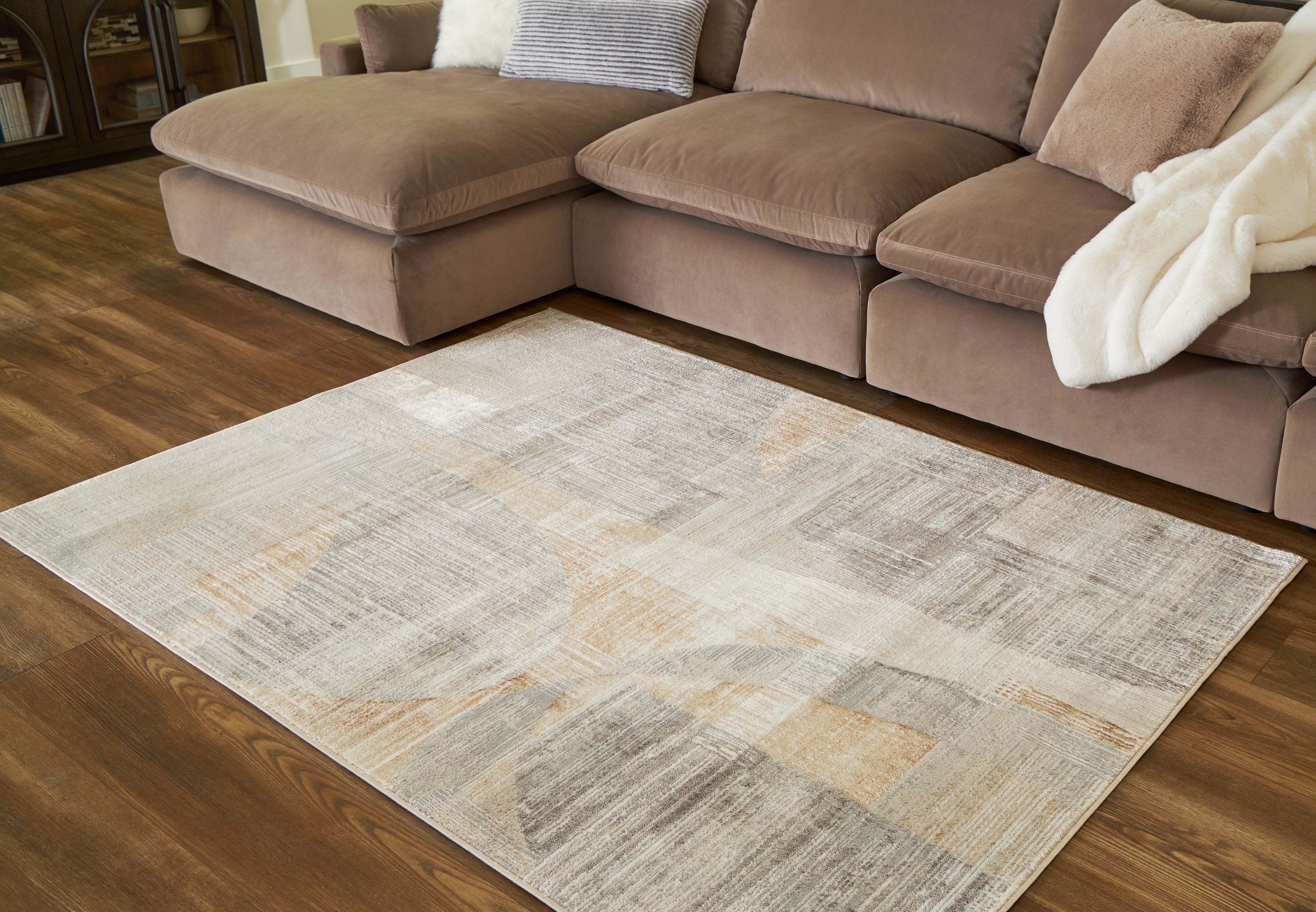 Elite Furniture Outlet - Ashley Furniture - Truward Rug - 5' x 7' Rug / Linen/Gray/Caramel - R406472