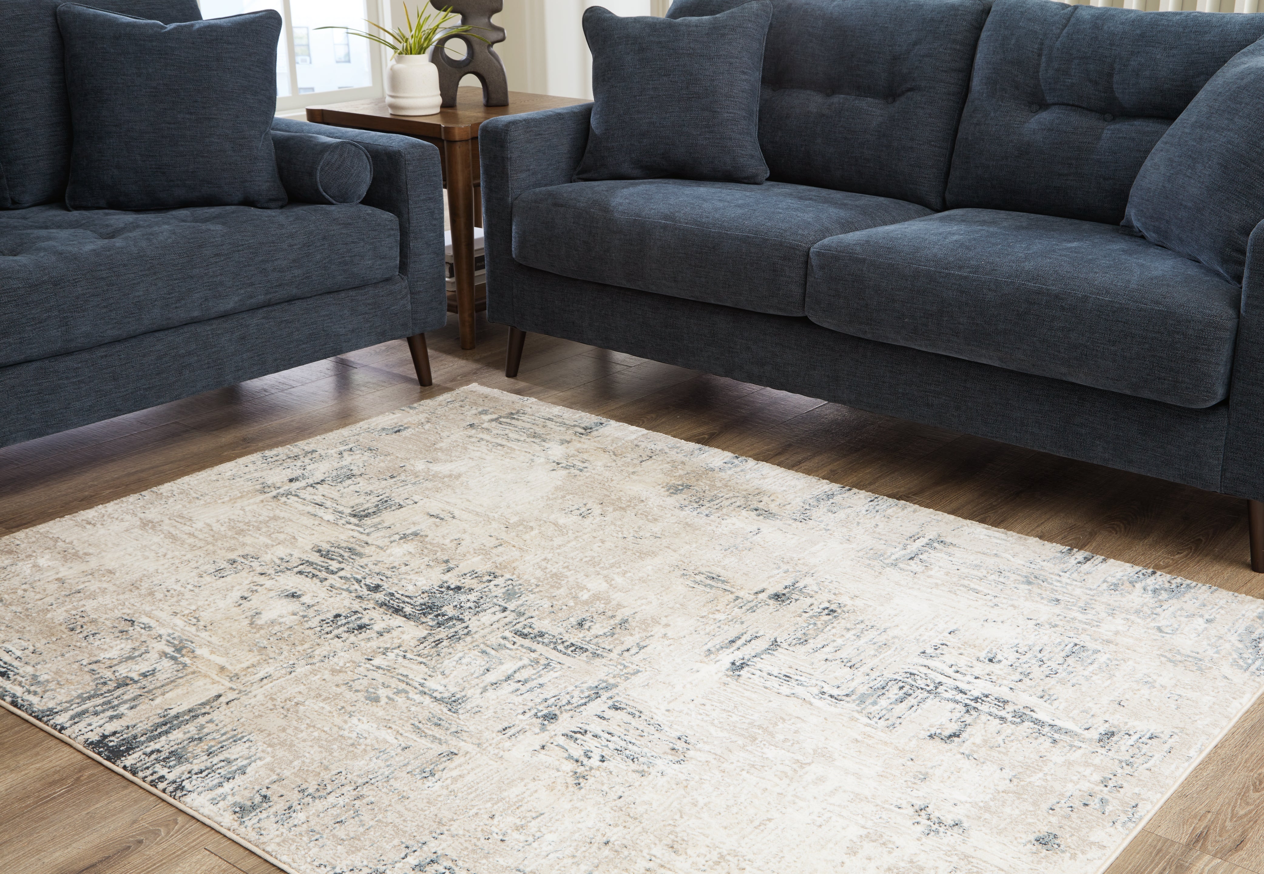 Elite Furniture Outlet - Ashley Furniture - Gentor Rug - 5' x 7' Rug / Blue/Ivory - R406522
