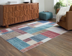Elite Furniture Outlet - Ashley Furniture - Numore Rug - 8' x 9'11" Washable Rug / Multi - R406661