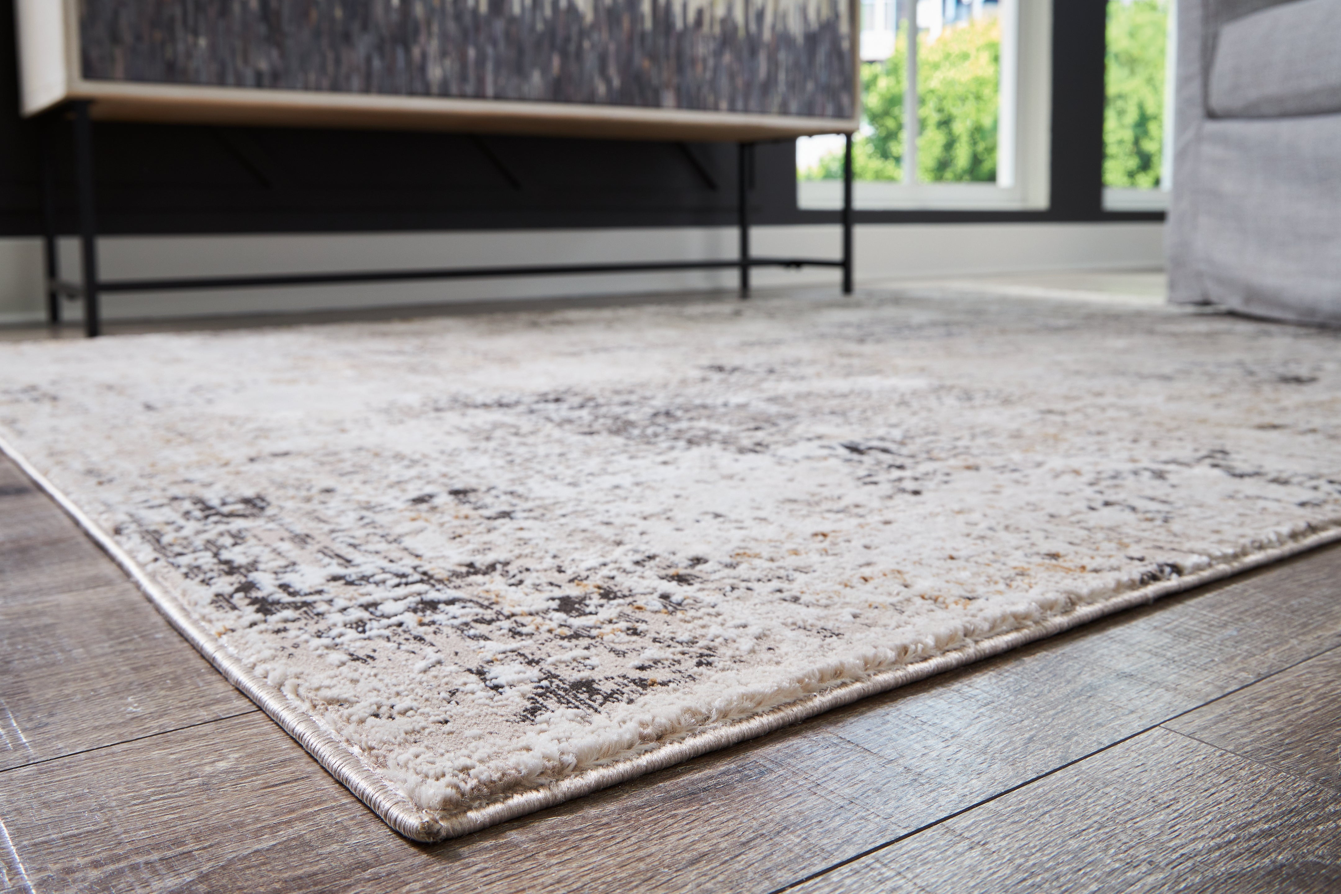 Elite Furniture Outlet - Ashley Furniture - Elaning Rug - 8' x 10' Rug / Black/Gray/Cream - R406701