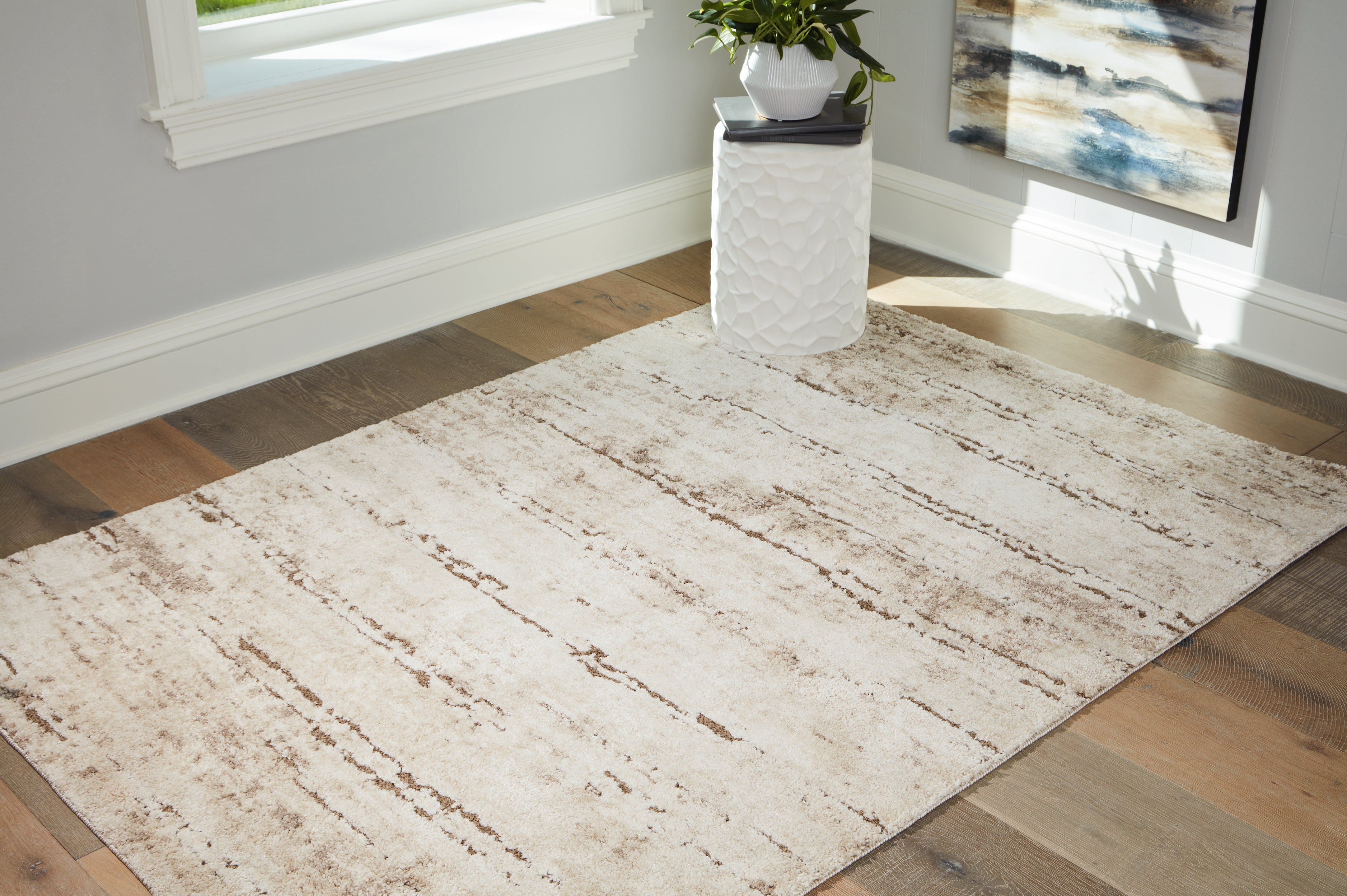 Elite Furniture Outlet - Ashley Furniture - Kasney Rug - 8' x 10' Rug / Cream/Brown - R406851