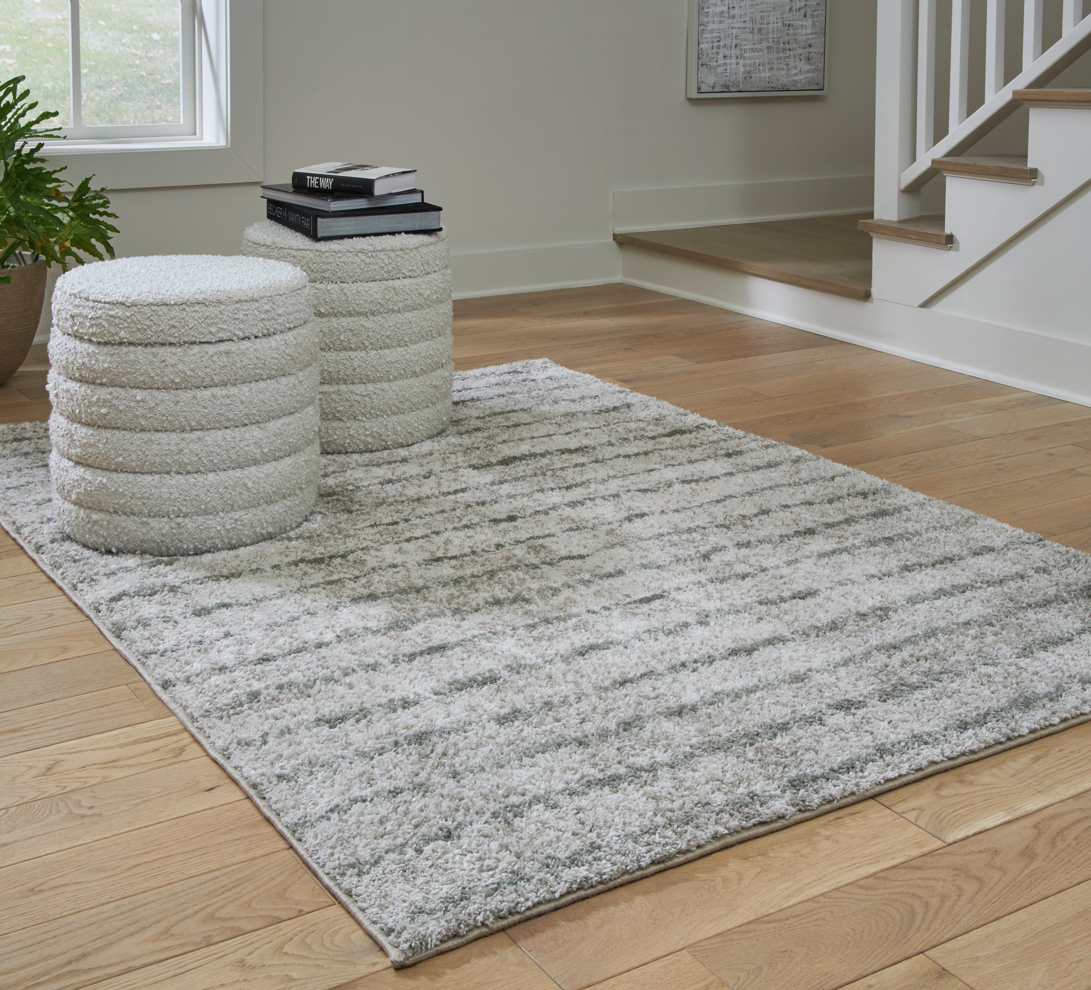 Elite Furniture Outlet - Ashley Furniture - Laddway Rug - 5' x 7' Rug / Cream/Green - R406882