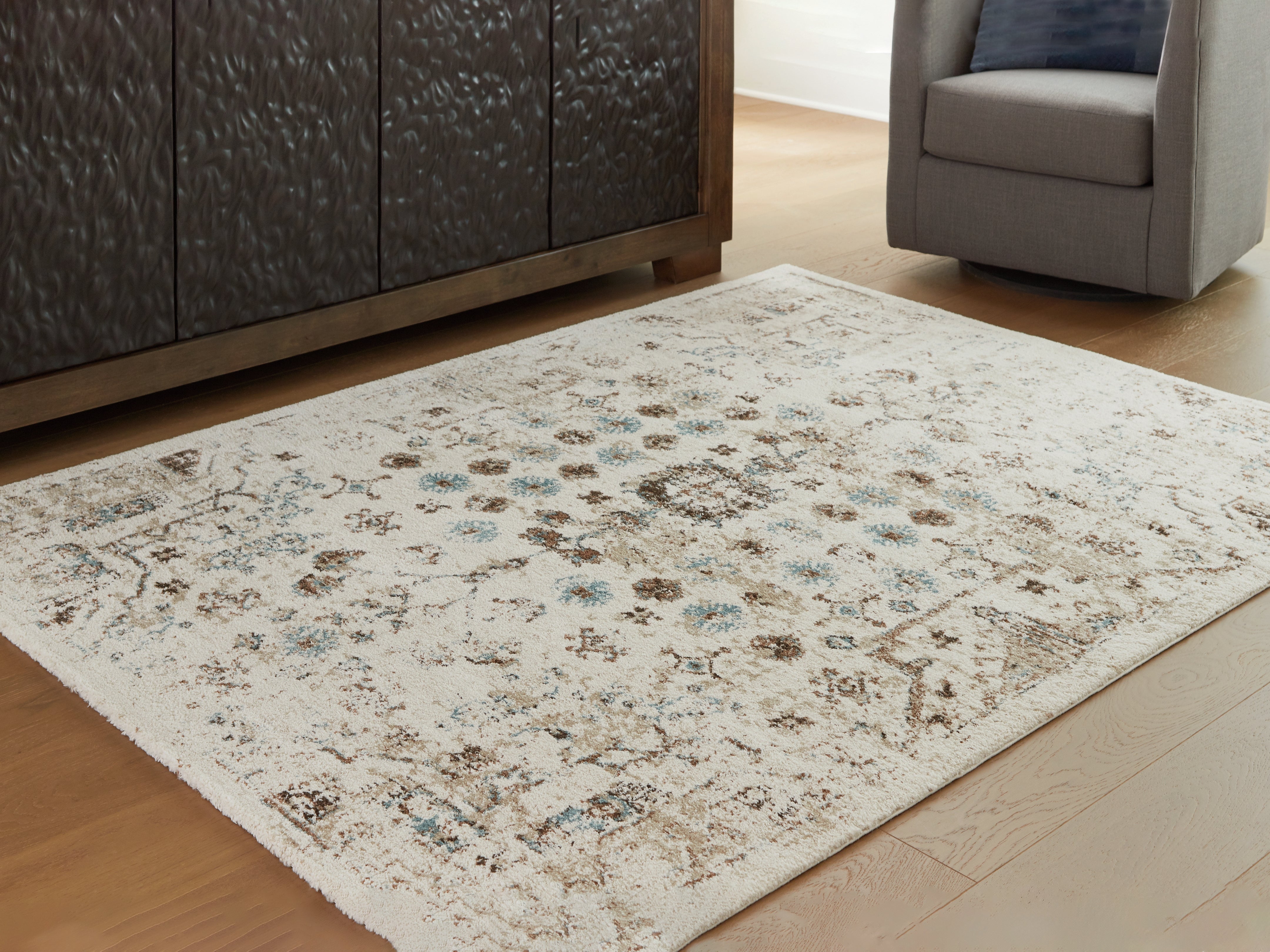 Elite Furniture Outlet - Ashley Furniture - Jossler Rug - 5' x 7' Rug / Ivory/Brown/Teal - R407072