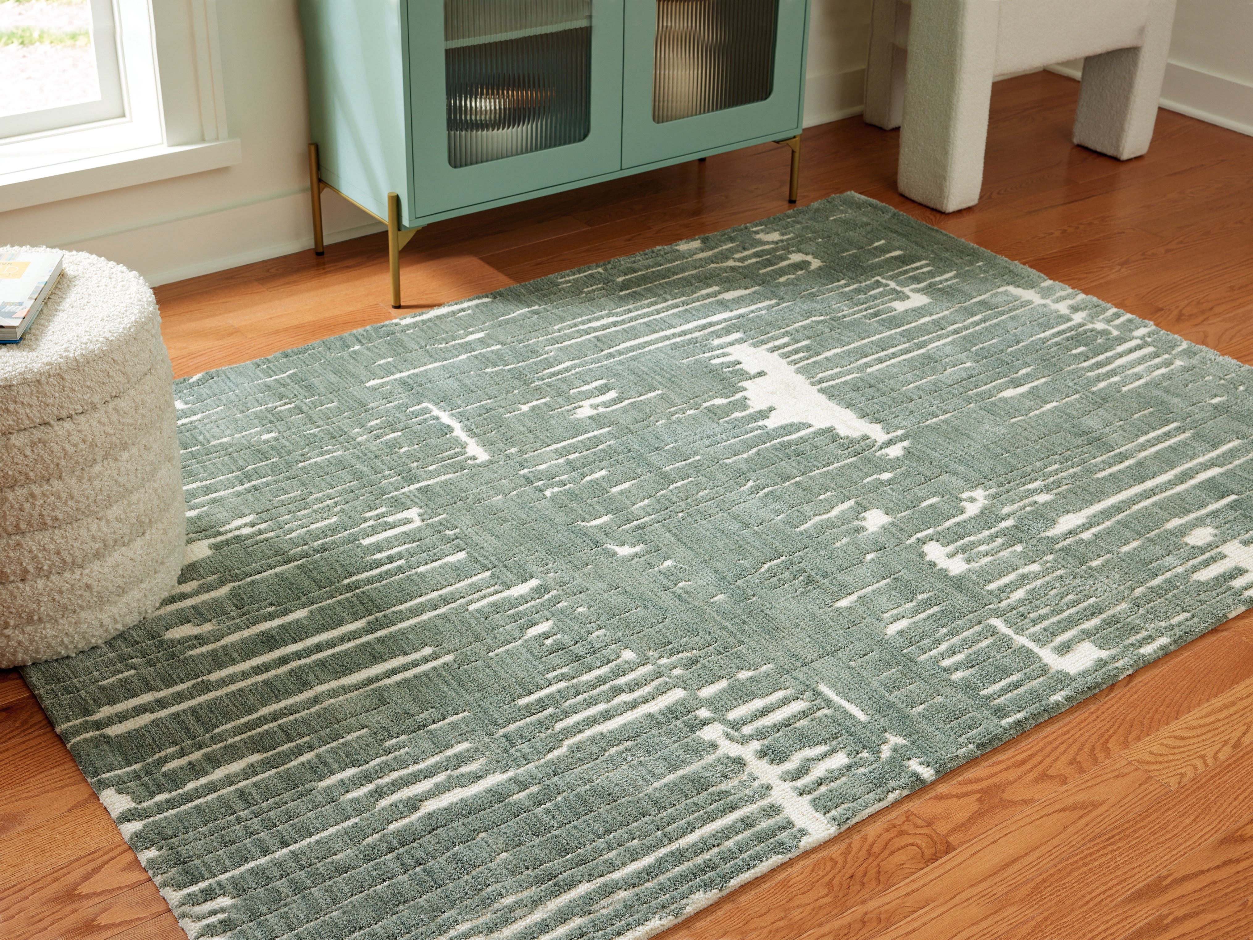 Elite Furniture Outlet - Ashley Furniture - Cayworth Rug - 5' x 7' Rug / Teal/White - R407092