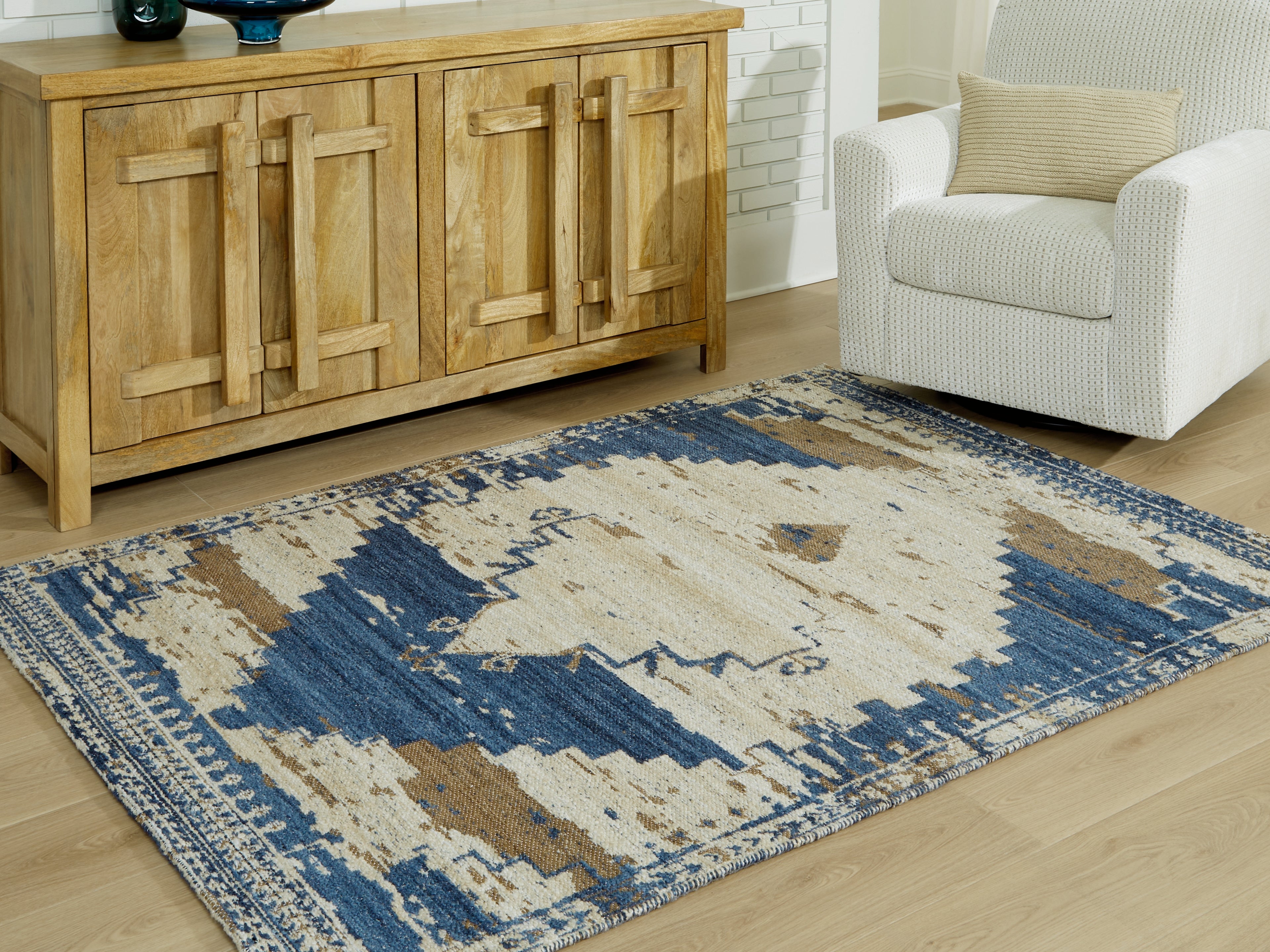 Elite Furniture Outlet - Ashley Furniture - Varnler Rug - 5' x 7' Rug / Blue/Brown/Tan - R407132