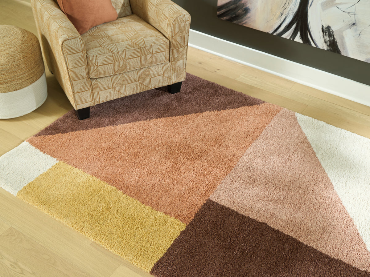 Elite Furniture Outlet - Ashley Furniture - Gailmore Rug - 5' x 7' Rug / Cream/Pink/Ocher - R407172