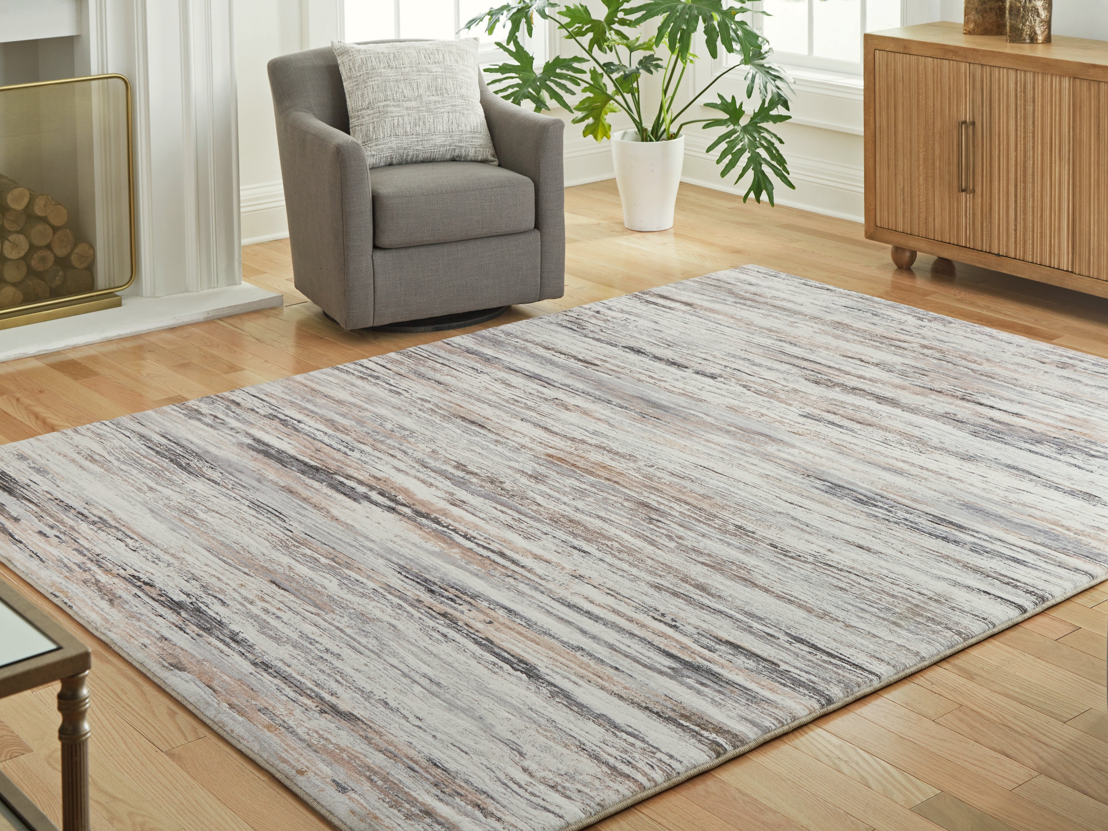 Elite Furniture Outlet - Ashley Furniture - Nace Rug - 7'6" x 9'6" Area Rug / Gray/Brown/White - R407471