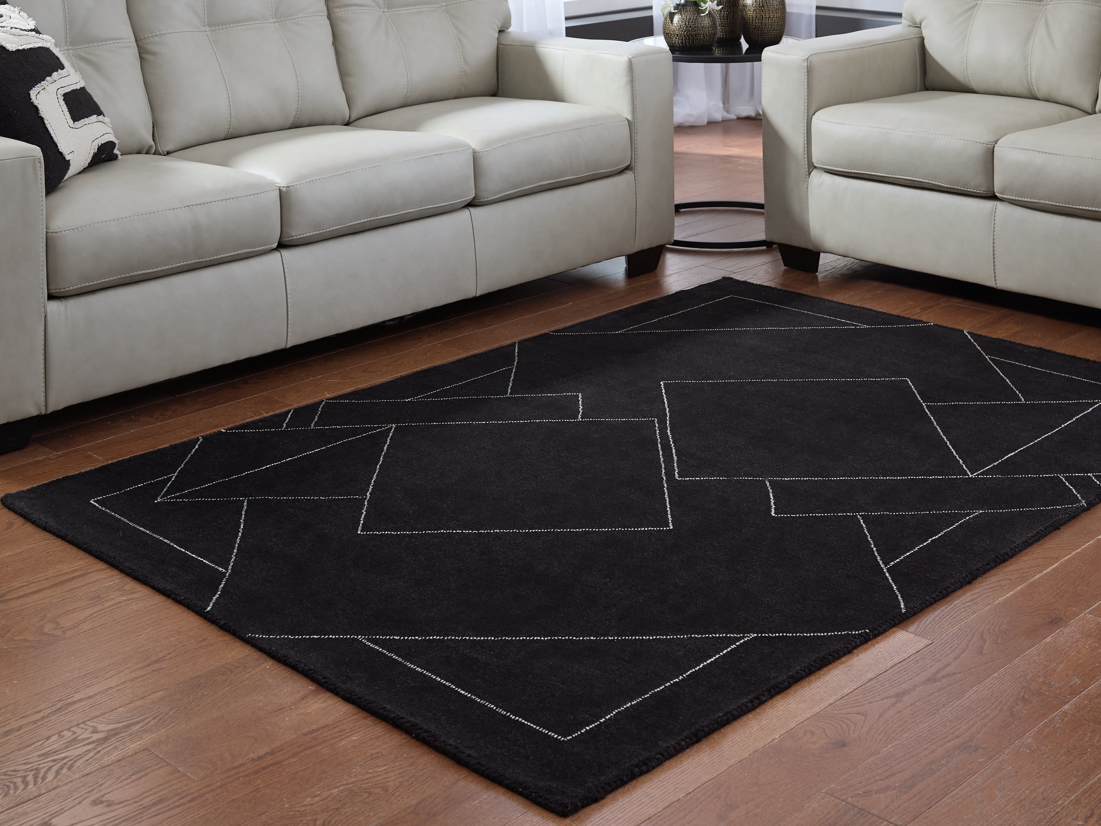 Elite Furniture Outlet - Ashley Furniture - Marav Rug - 5' x 7' Area Rug / Black/White - R407532