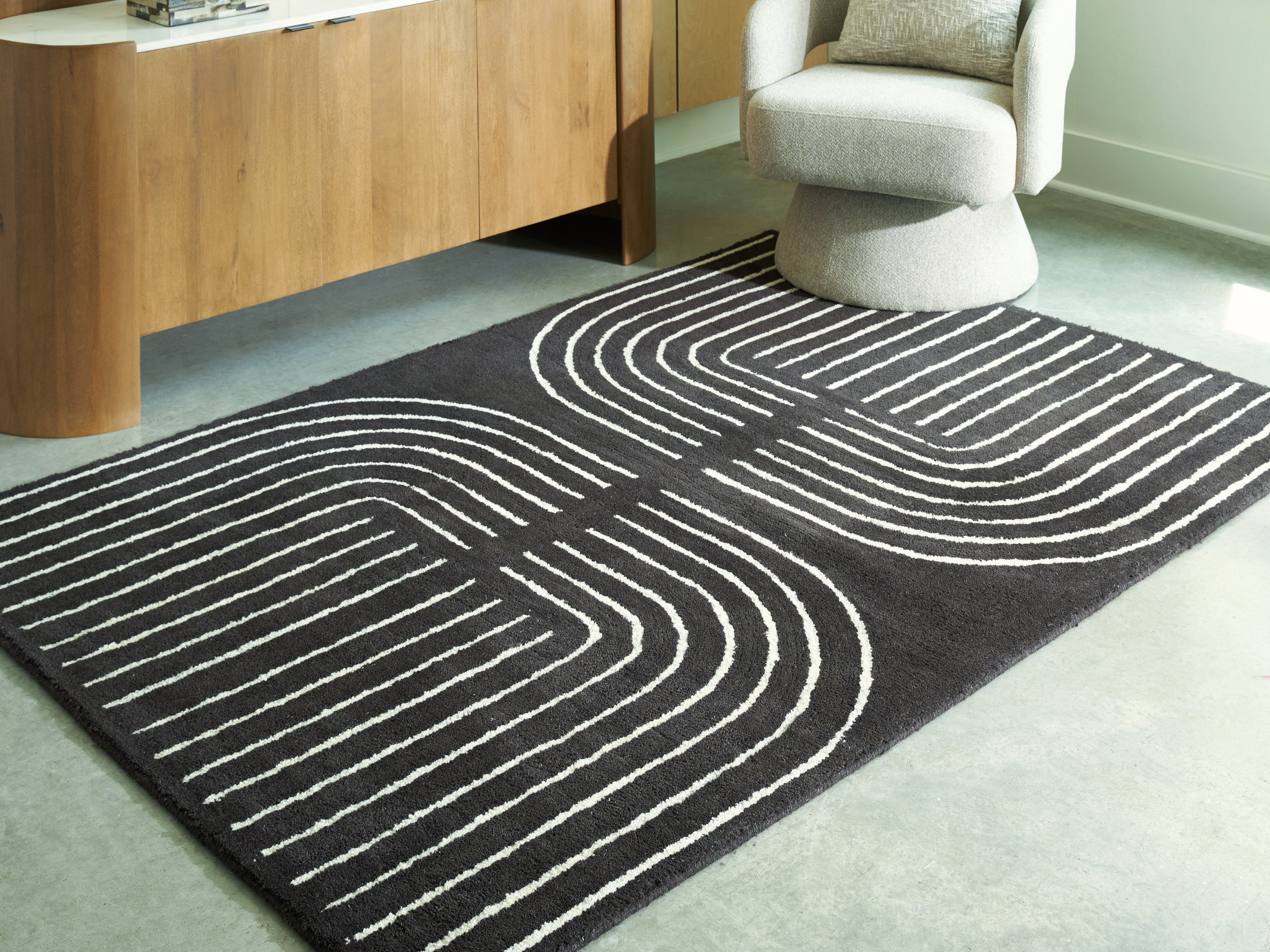 Elite Furniture Outlet - Ashley Furniture - Eldonmore Rug - 5' x 7' Area Rug / Black/Ivory - R407572