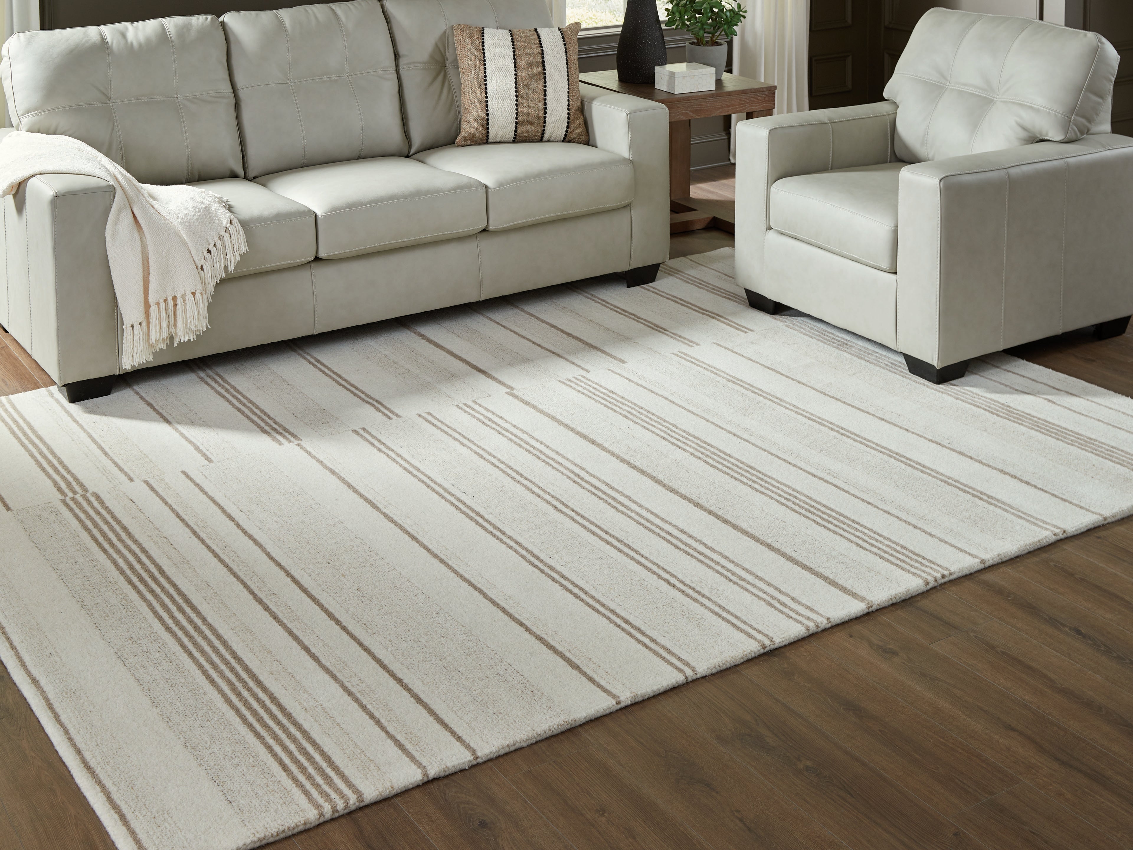 Elite Furniture Outlet - Ashley Furniture - Gadence Rug - 7'8" x 10' Area Rug / Ivory/Tan - R407641
