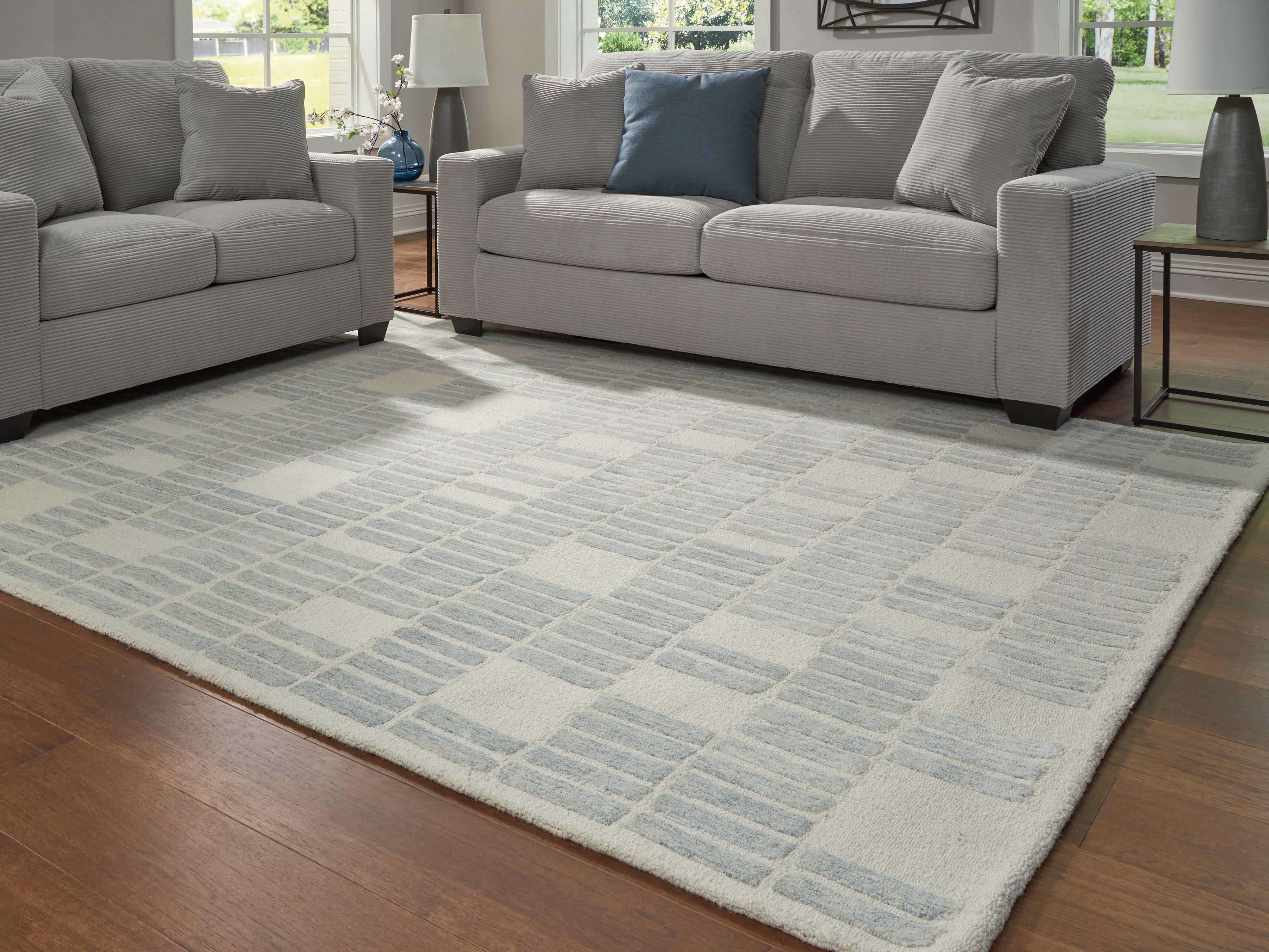 Elite Furniture Outlet - Ashley Furniture - Dylanton Rug - 7'8" x 10' Area Rug / Ivory/Blue - R407811