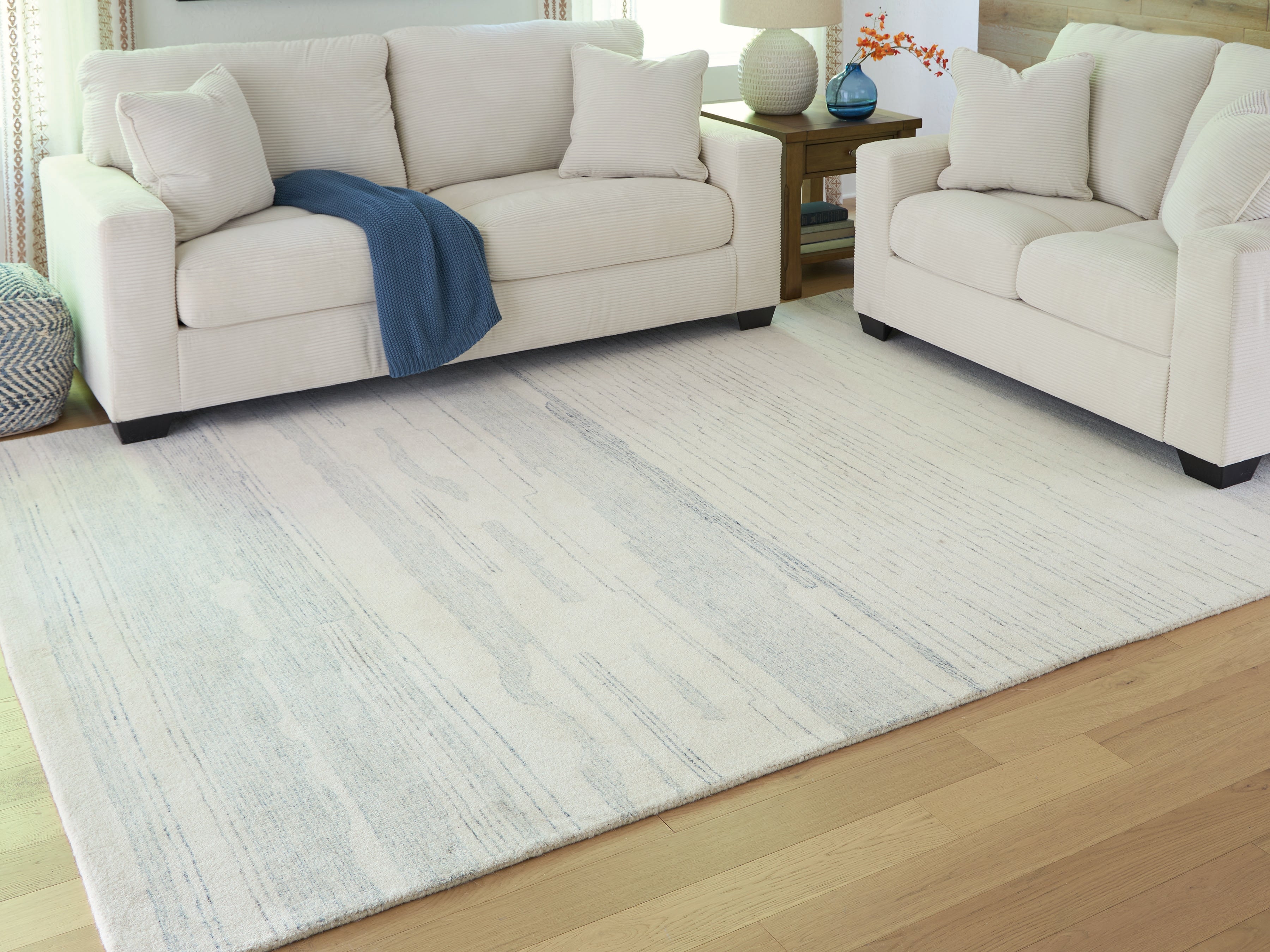 Elite Furniture Outlet - Ashley Furniture - Genemost Rug - 7'8" x 10' Area Rug / Ivory/Blue - R407841
