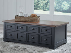 Elite Furniture Outlet - Ashley Furniture - Wildenauer Lift-Top Coffee Table - Lift Top Cocktail Table / Brown/Black - T664-9