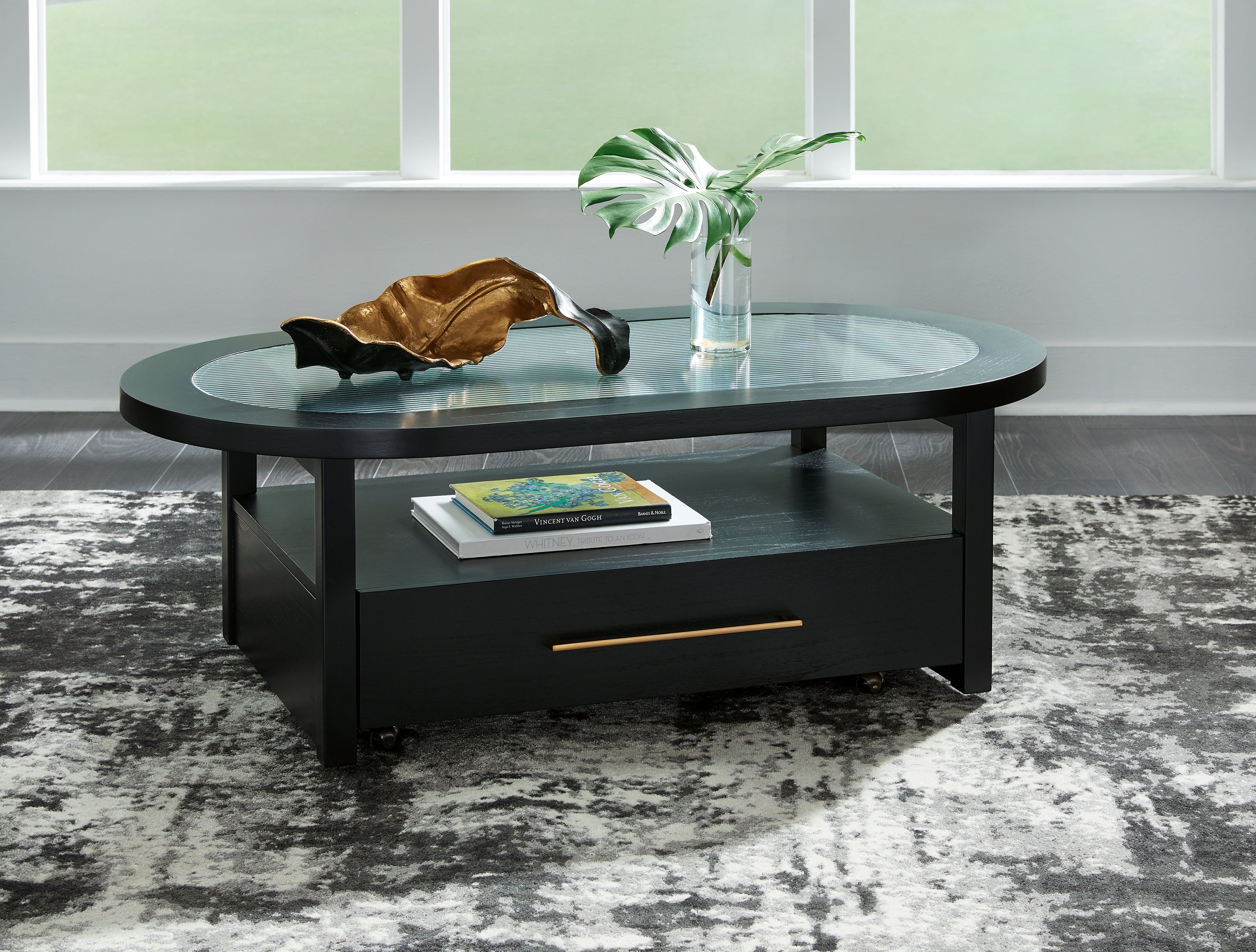 Elite Furniture Outlet - Ashley Furniture - Winbardi Coffee Table - Oval Cocktail Table / Black - T786-0