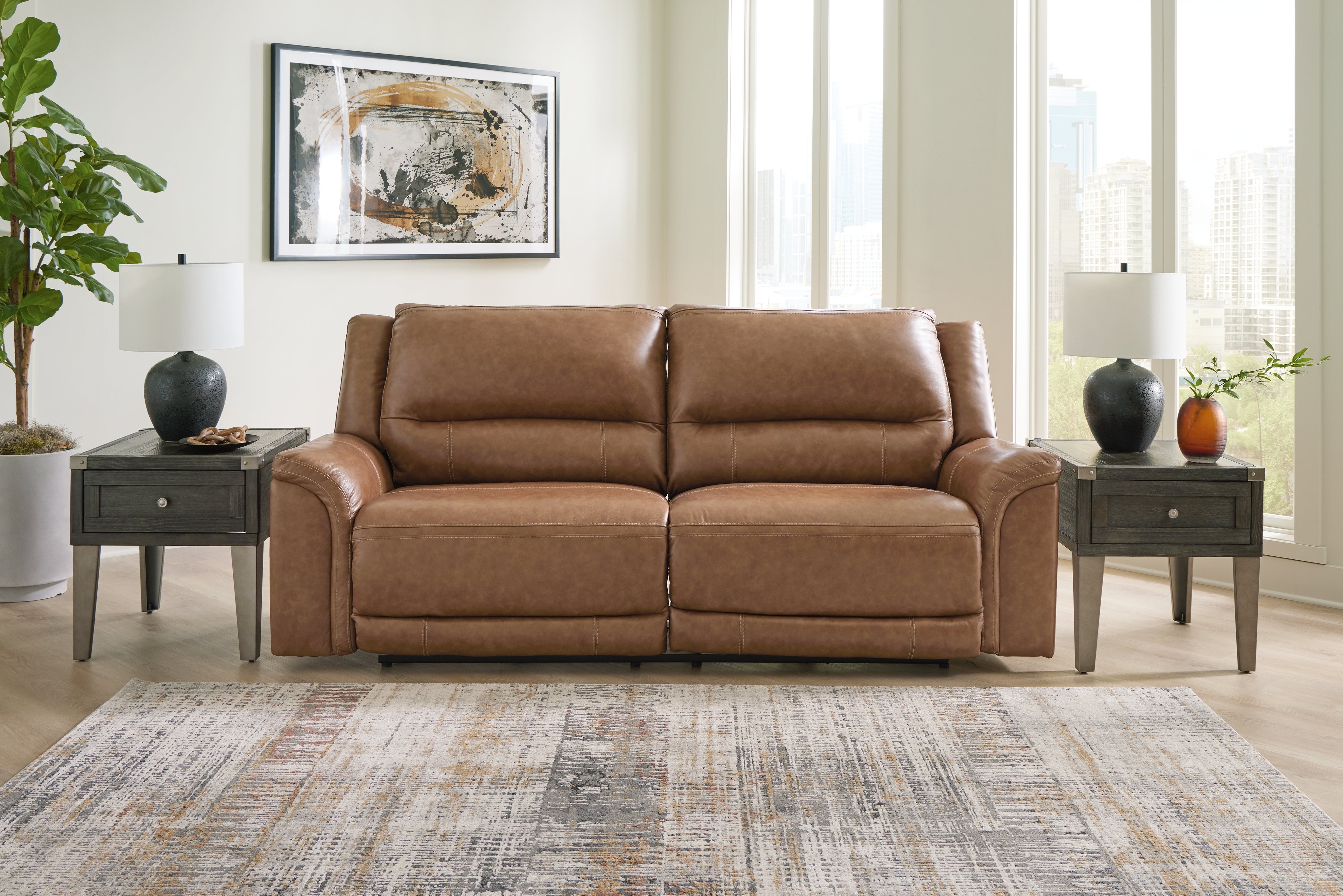 Elite Furniture Outlet - Ashley Furniture - Trasimeno Living Room - 2 Seat PWR REC Sofa ADJ HDREST / Caramel - U8281547
